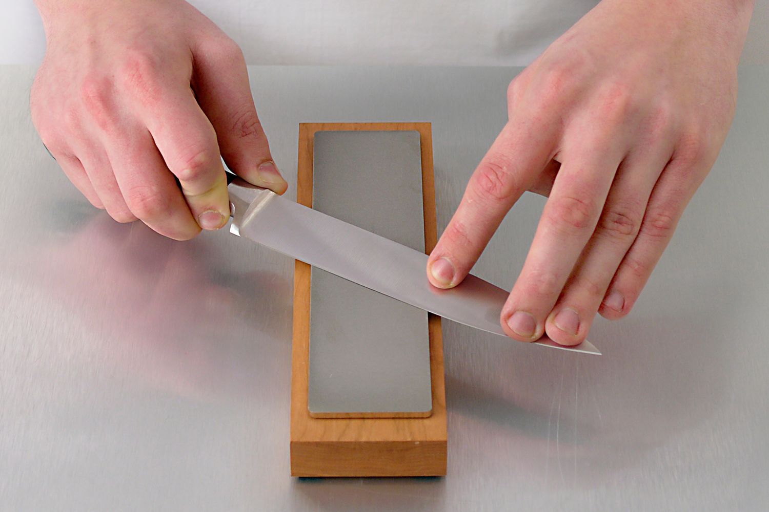 How To Sharpen A Kitchen Knife With A Stone