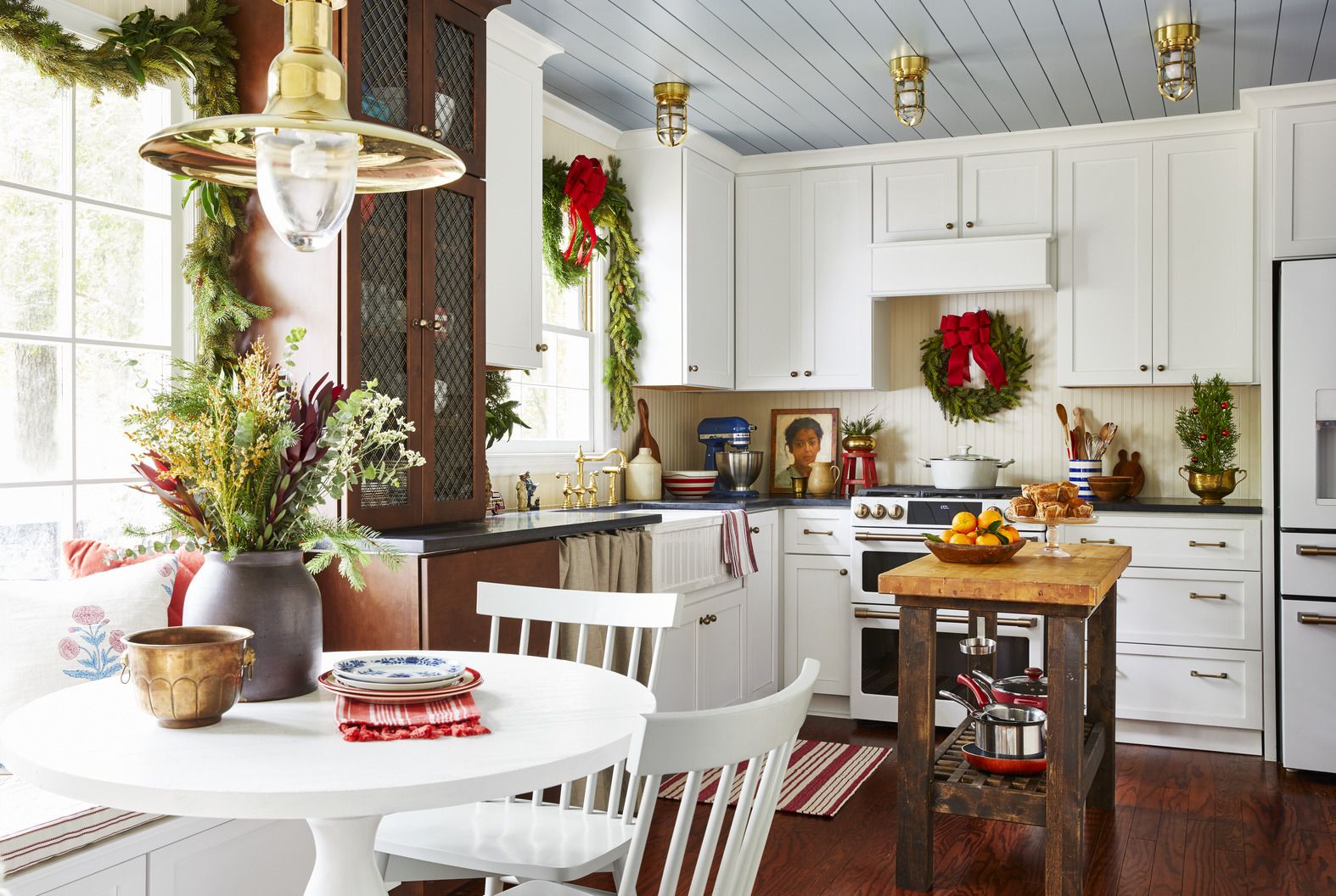 Installing Christmas Ribbon on Kitchen Cabinets